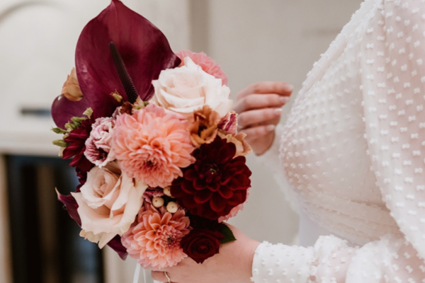 Bride with burgundy flowers